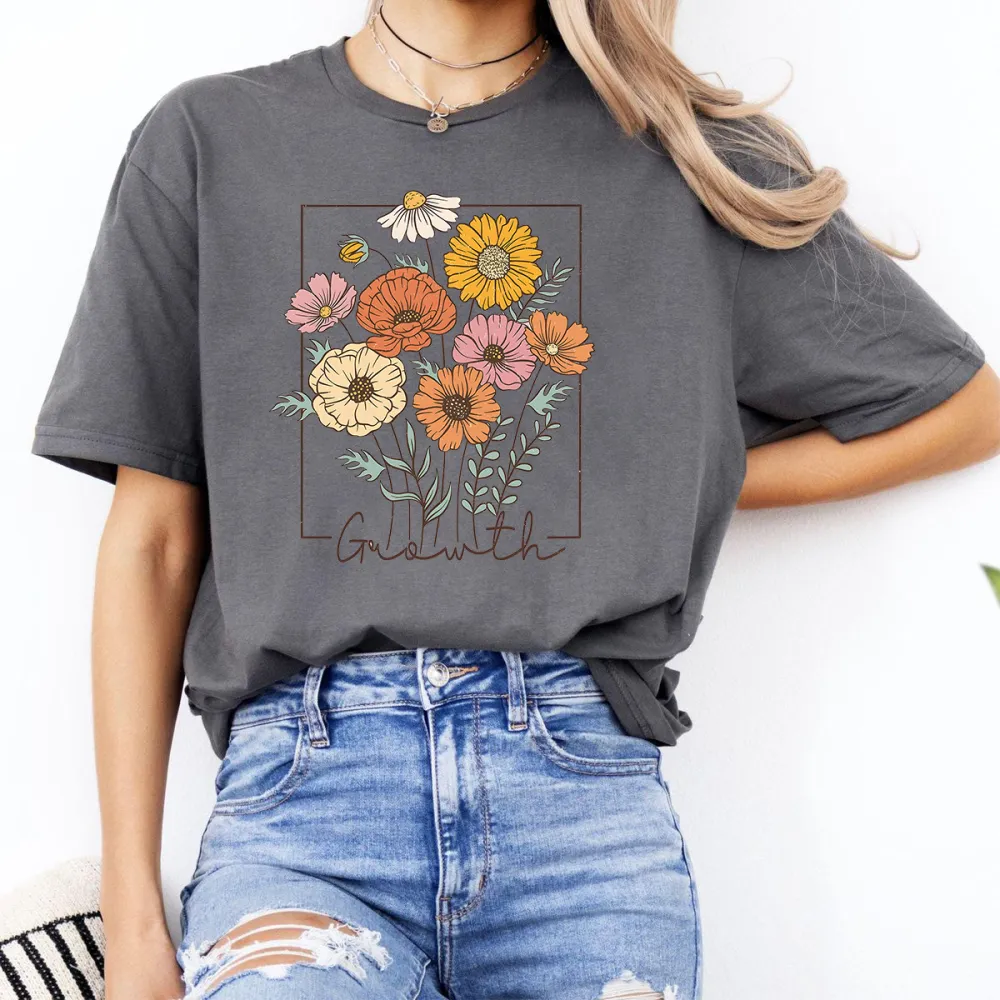 A Floral Design With Flowers In Various Colors Such As Yellow, Orange, Pink, And Branches Surrounding The Flowers. 