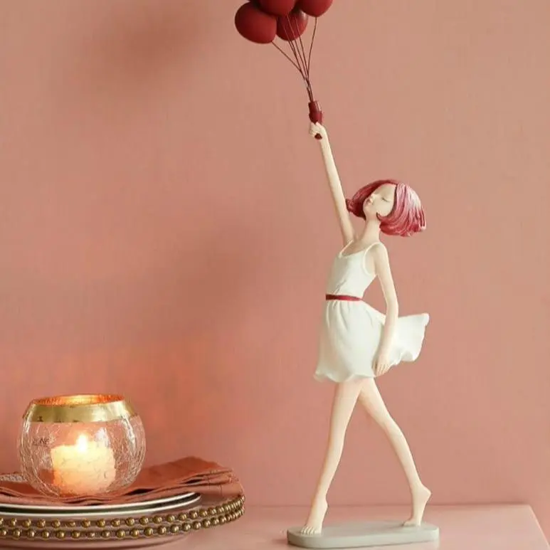 Girl With Balloon Sculpture