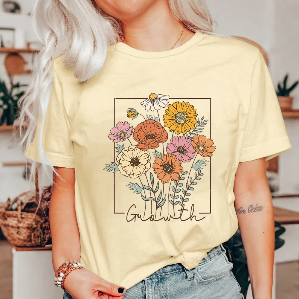 A Floral Design With Flowers In Various Colors Such As Yellow, Orange, Pink, And Branches Surrounding The Flowers. 