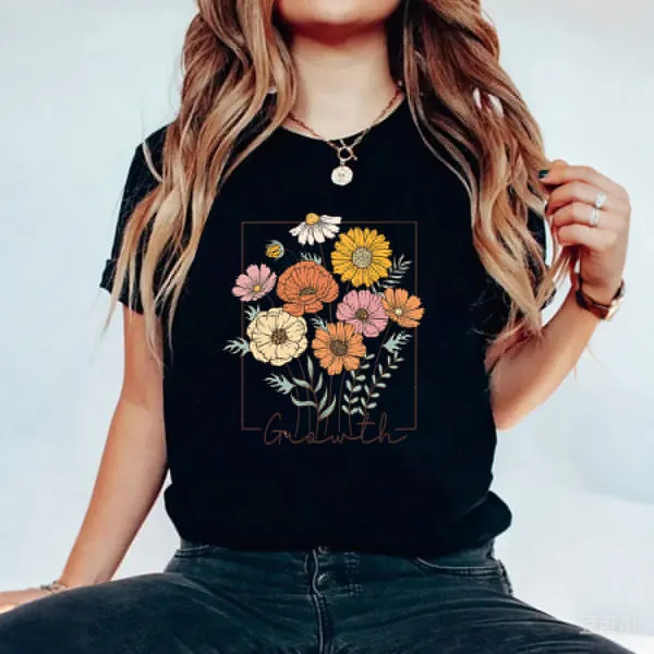 A Floral Design With Flowers In Various Colors Such As Yellow, Orange, Pink, And Branches Surrounding The Flowers. 