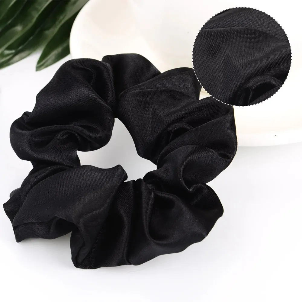 A Pack Of Ten Black Satin Elastic Hair Bands